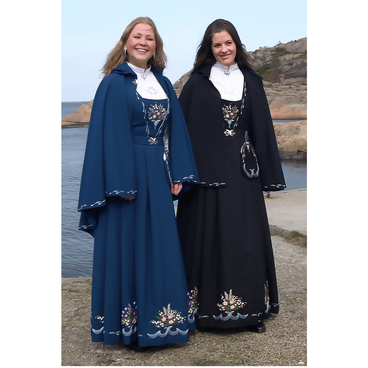Hvalerdrakt_cape_svart_bla_dame.png